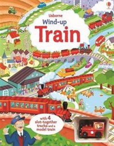 Wind-up train book with slot-together tracks and a model train  